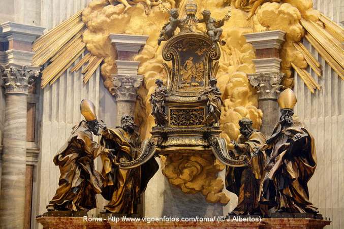 La cátedra, es en realidad, el trono que Carlos el Calvo regaló al papa Juan VIII y en el que fue coronado emperador el día de Navidad del año 875. Carlos el Calvo era nieto de Carlomagno. Durante muchos años la silla fue utilizada por el papa y sus sucesores durante las ceremonias litúrgicas, hasta que fue incorporada al Altar de la Cátedra de Bernini en 1666. Tradiciones, leyendas y creencias afirmaron durante muchos años que la silla era doble y que algunas partes se remontaban a los primeros días de la era cristiana e incluso que la utilizó San Pedro en persona. La silla ha sido objeto de numerosos estudios a lo largo de los siglos y la última vez que fue extraída del nicho que ocupa en el altar de Bernini fue durante un período de seis años, entre 1968 y 1974. Los análisis efectuados en aquella ocasión apuntaban a que se trataba de una sola silla cuyas partes más antiguas eran del siglo VI. Lo que se había tomado por una segunda silla era en realidad una cubierta que servía tanto para proteger el trono como para llevarlo en procesión.
